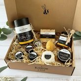 Blossom & Hive gift, including natural chai, honey, soap, balms, and other items in a box.