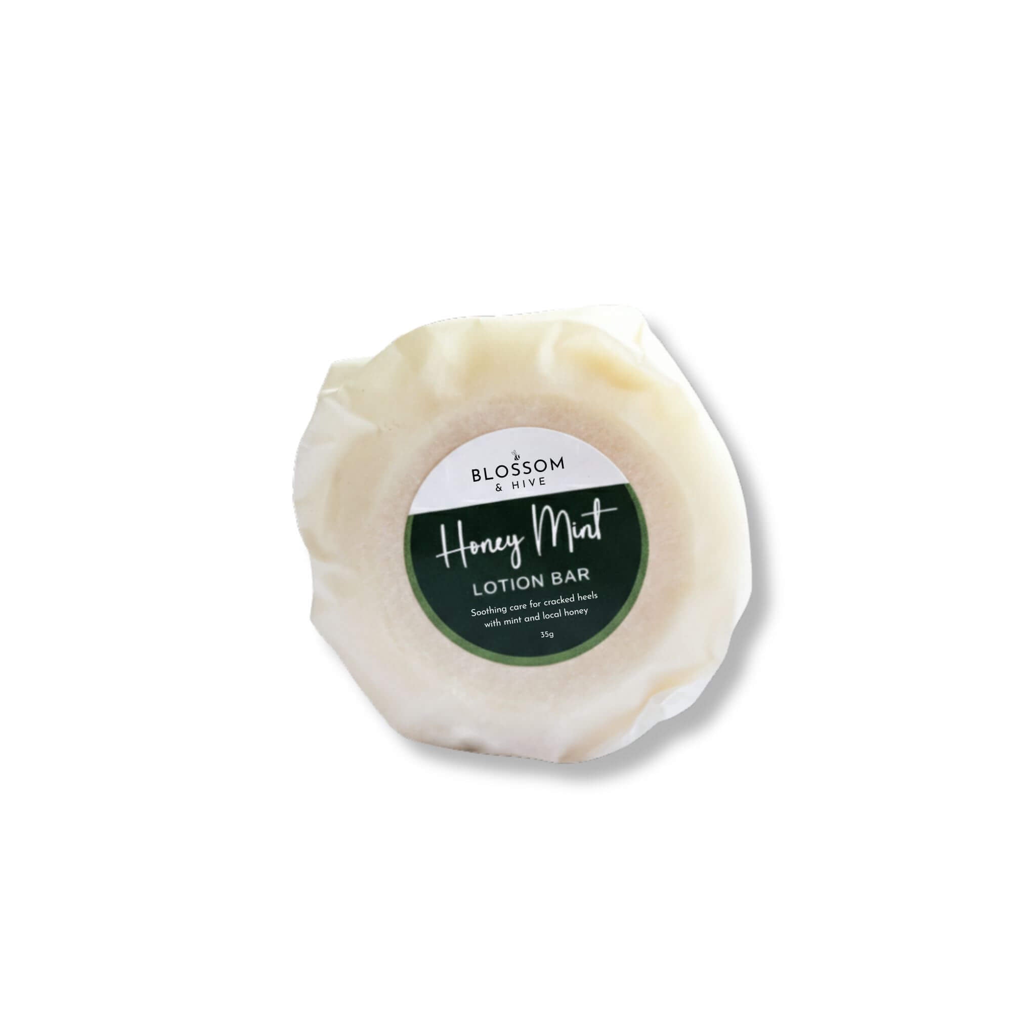 Blossom & Hive Honey and Mint lotion bar wrapped in paper with a label on the front.  