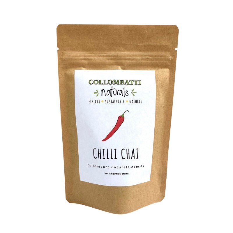  A kraft paper pouch of Collombatti Naturals Chilli Chai, featuring an illustration of a red chilli on the label. This bold, handcrafted loose-leaf chai combines warming spices with a fiery kick of chilli for a uniquely spiced and invigorating brew.